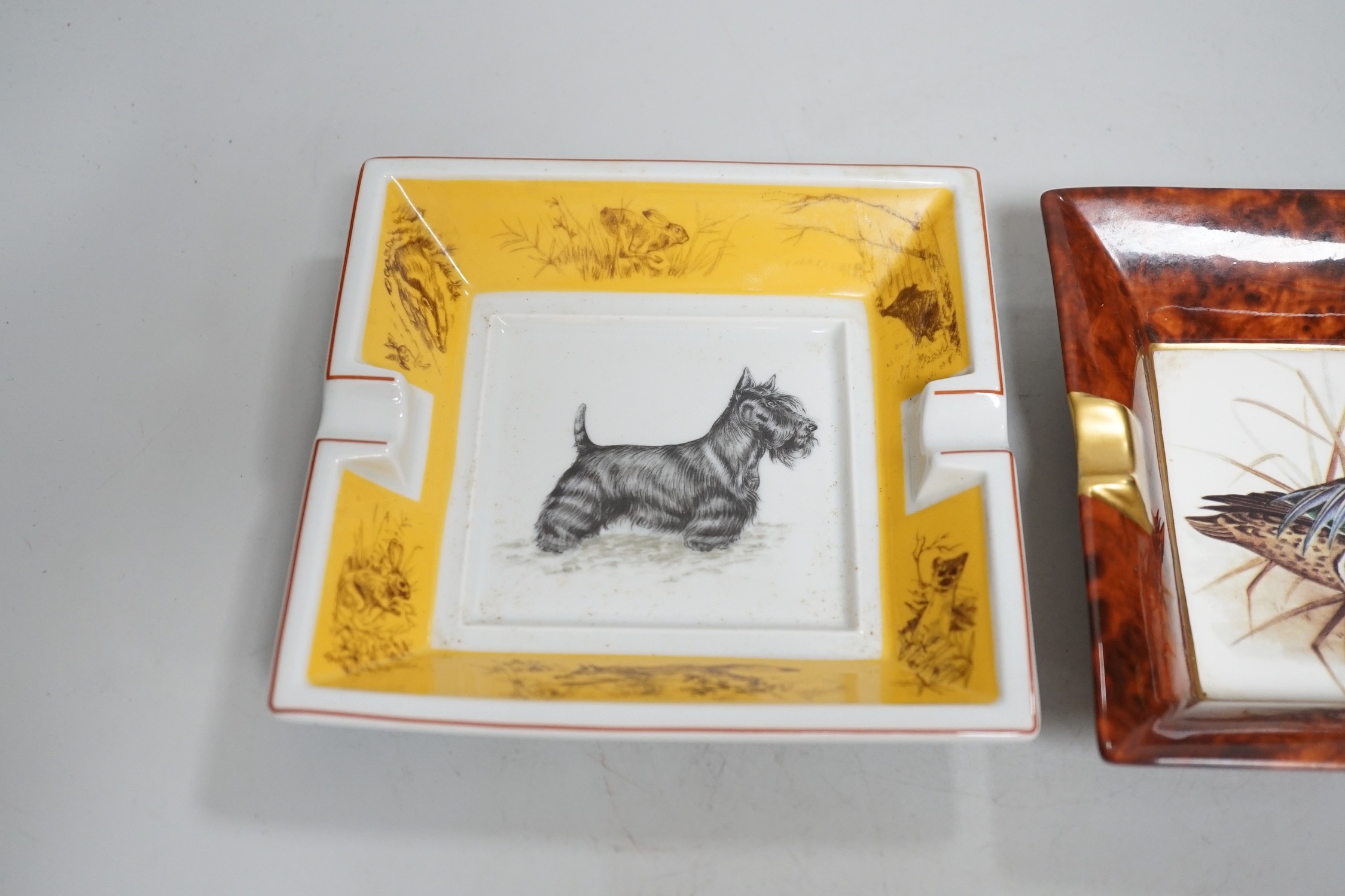 An Hermes ‘Scottish Terrier’ ashtray, 16cm wide, and another